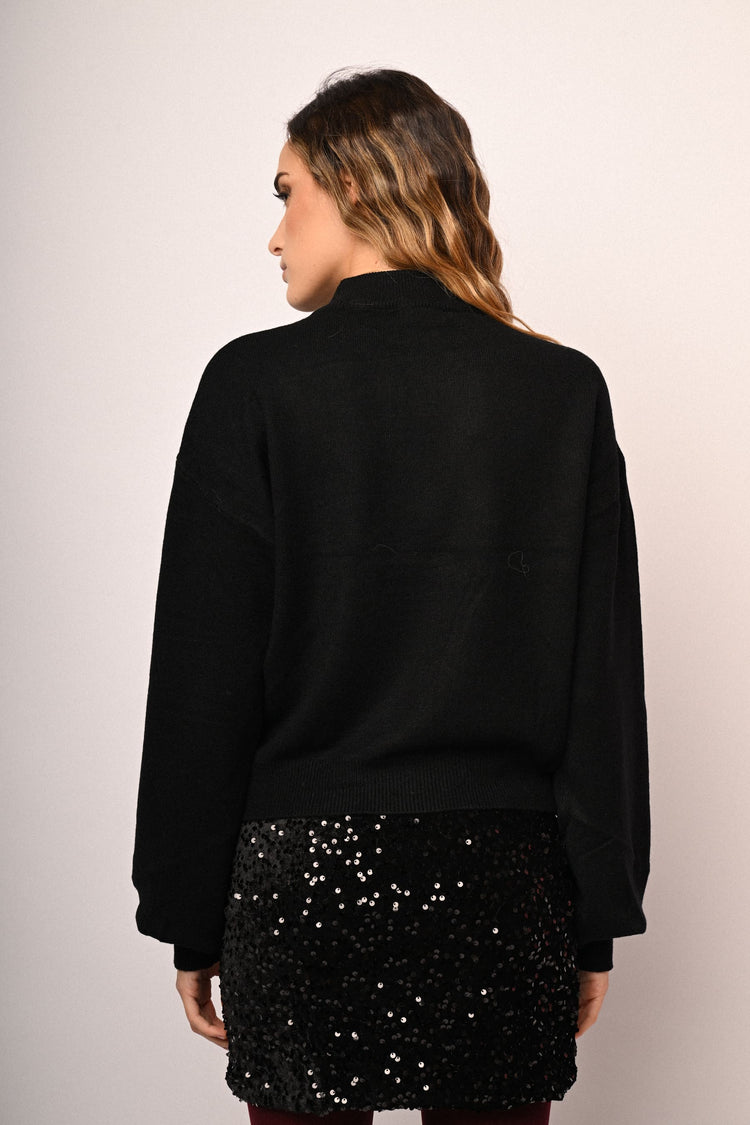 Dolcevita con strass ai polsini