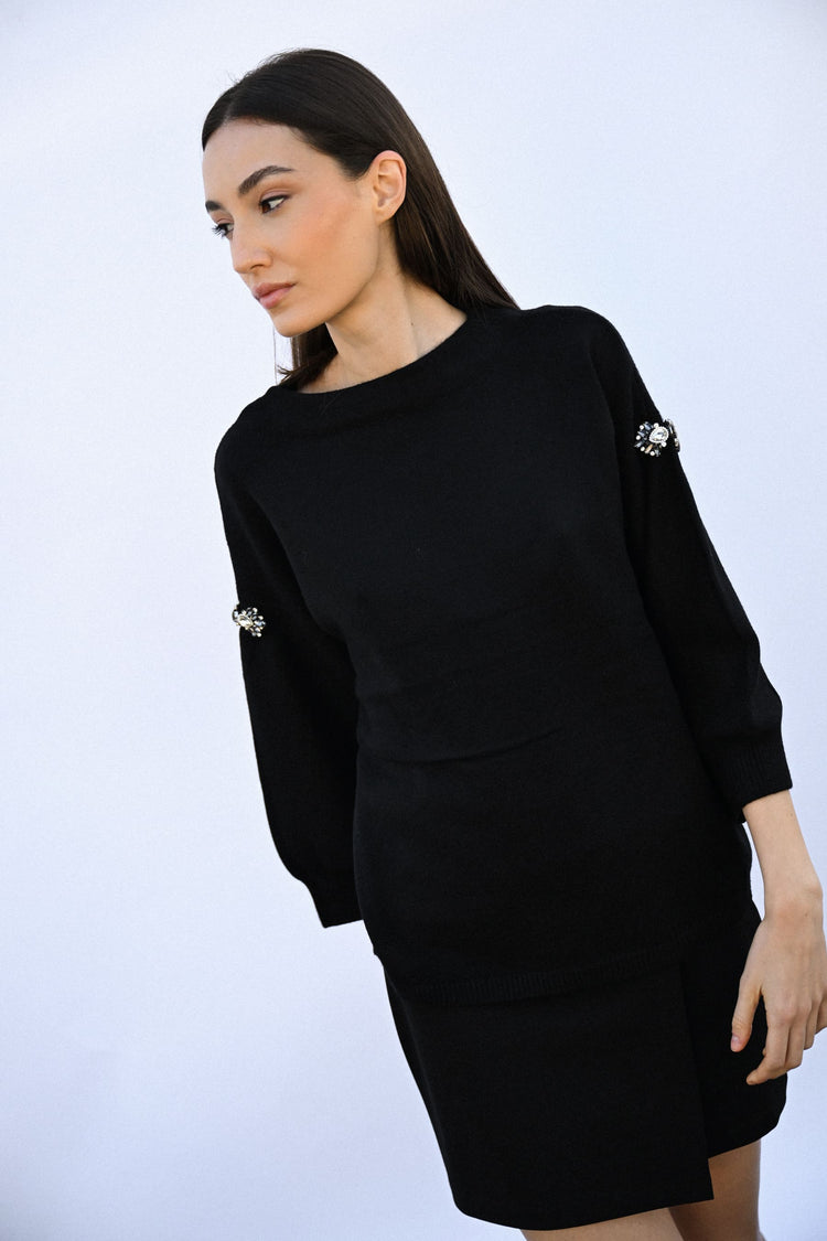 Pull con decorazioni gioiello