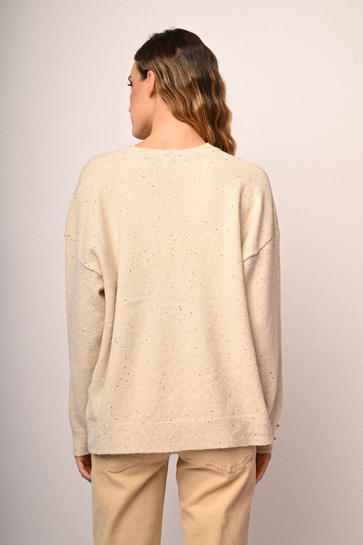 Pull con bottoni a cuore e strass