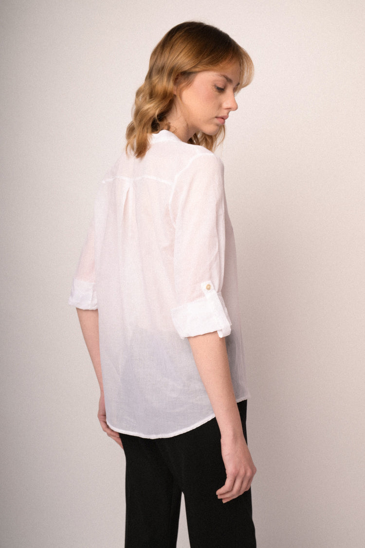 Blusa in cotone bianco con taschino