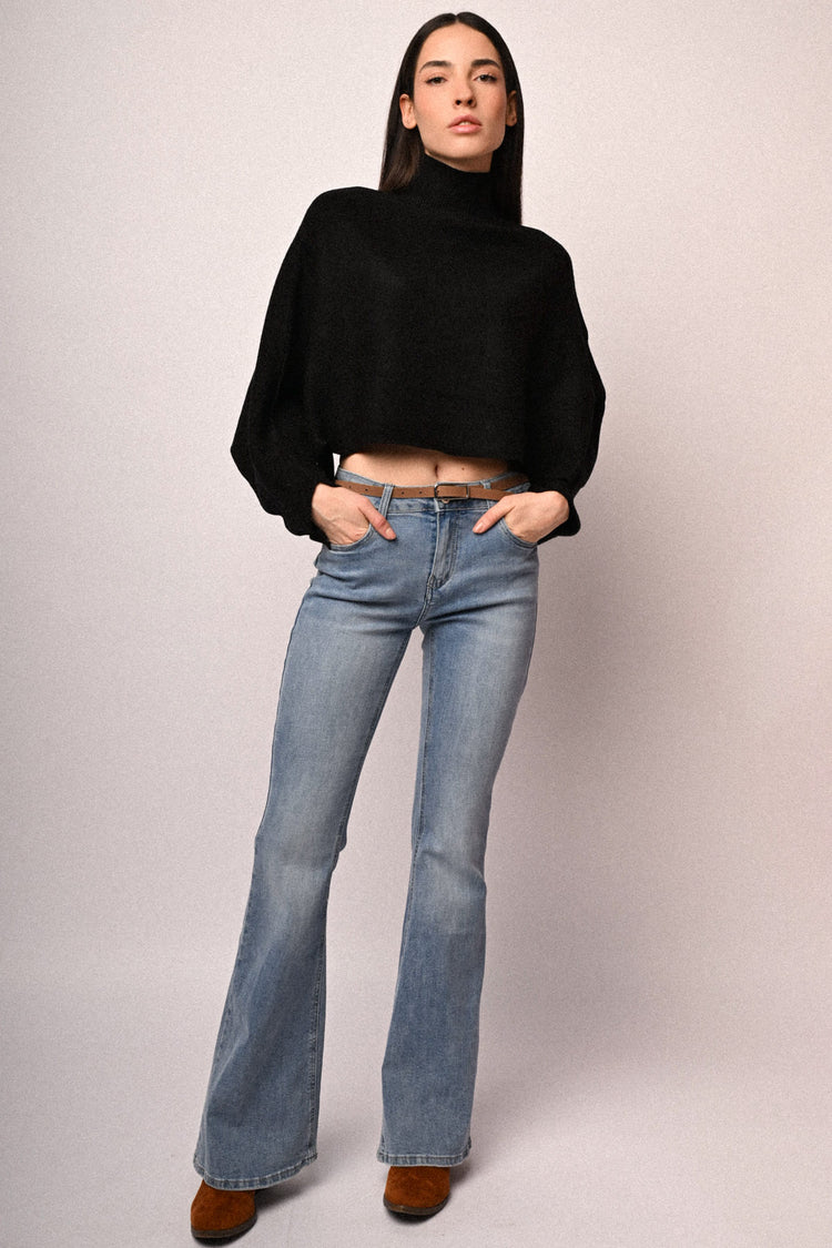 Pull a poncho con bottoni