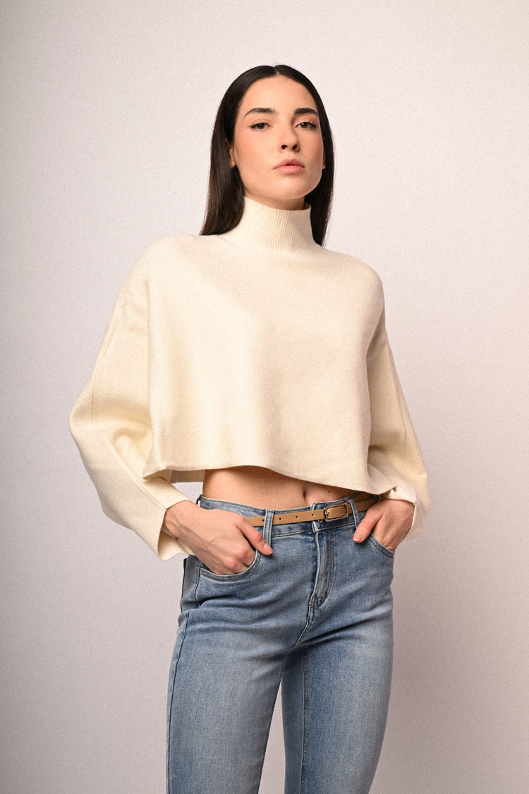 Pull a poncho con bottoni