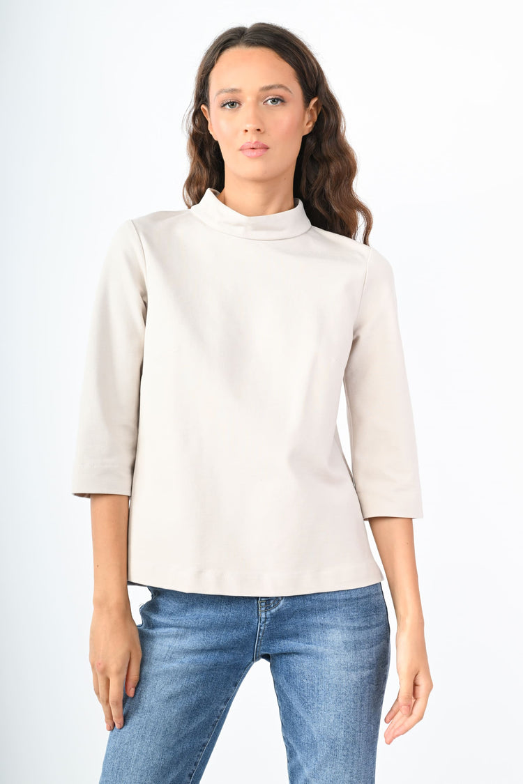 Blusa con collo a cratere