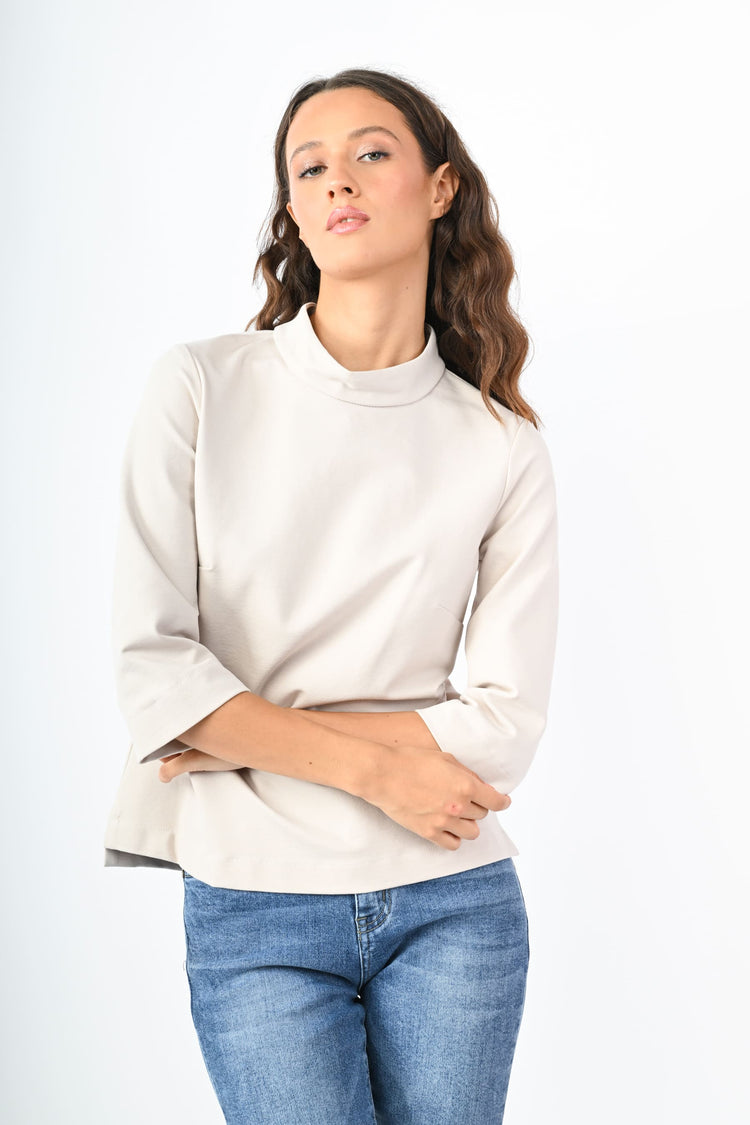 Blusa con collo a cratere