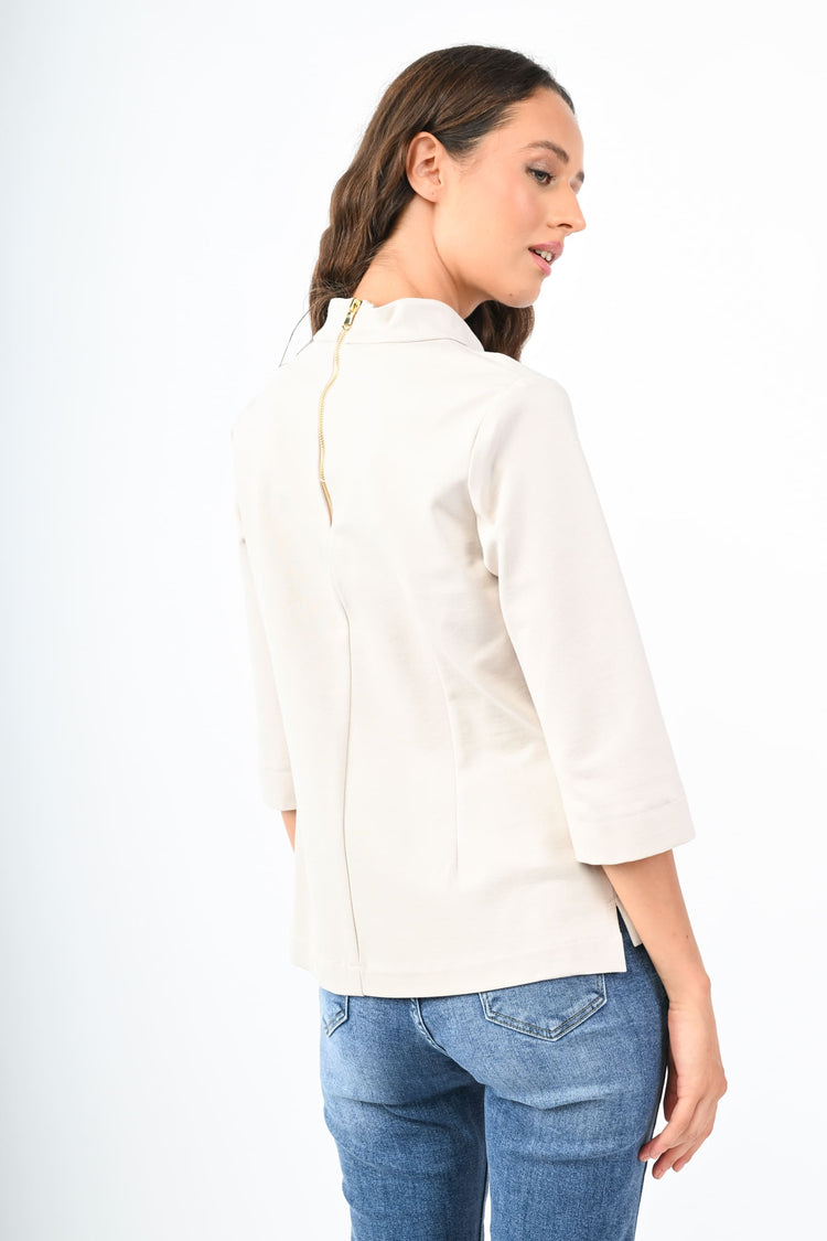 Blusa con collo a cratere