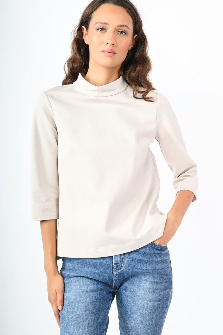 Blusa con collo a cratere