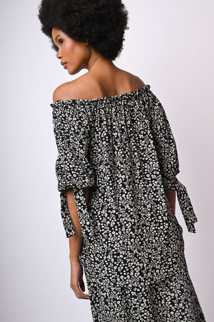 Blusa con spalle scoperte e stampa floreale
