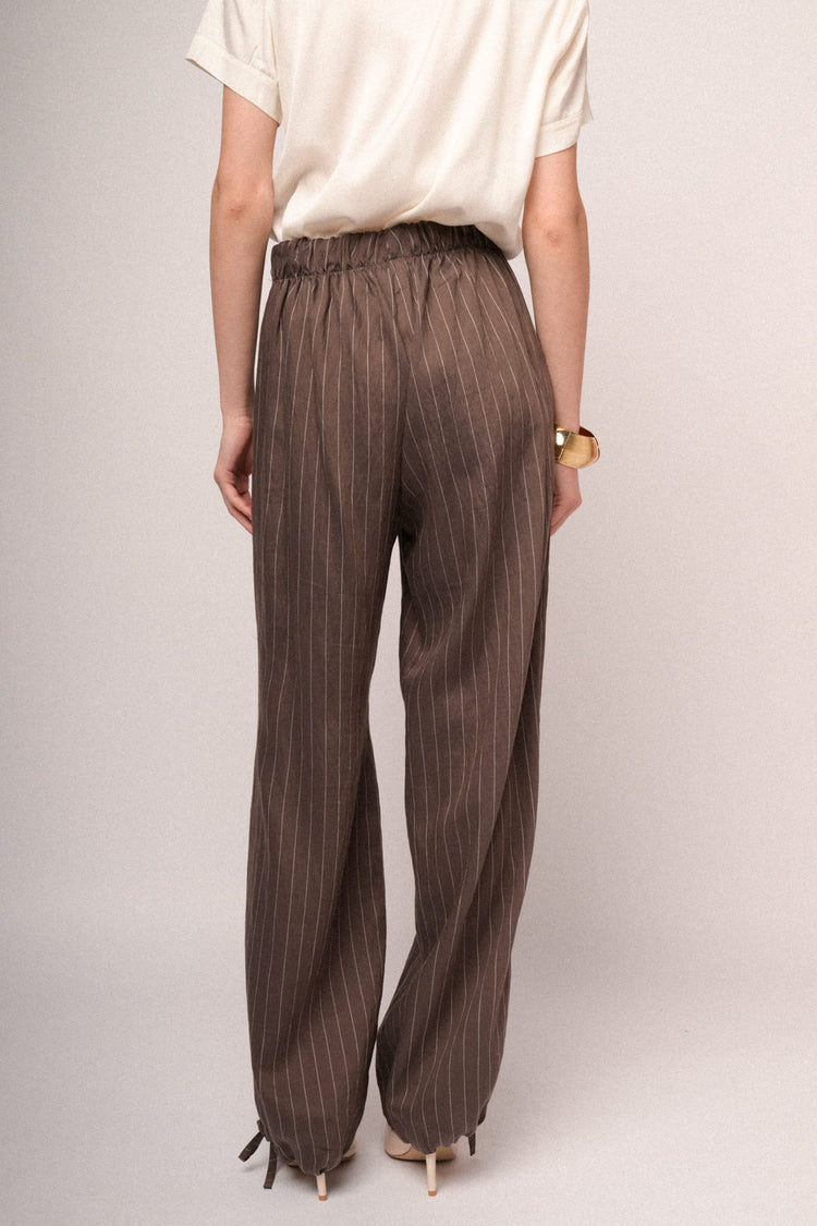 Pantaloni palazzo in gessato cioccolato con coulisse allorlo