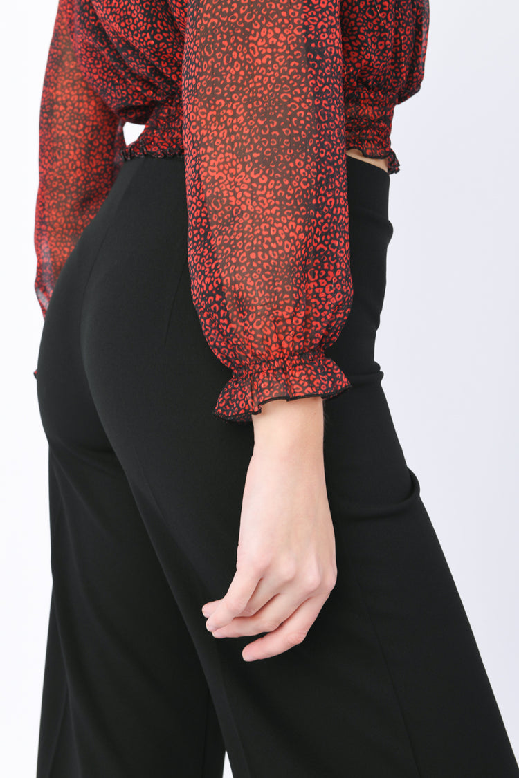 Blusa con rouches a stampa leopardata