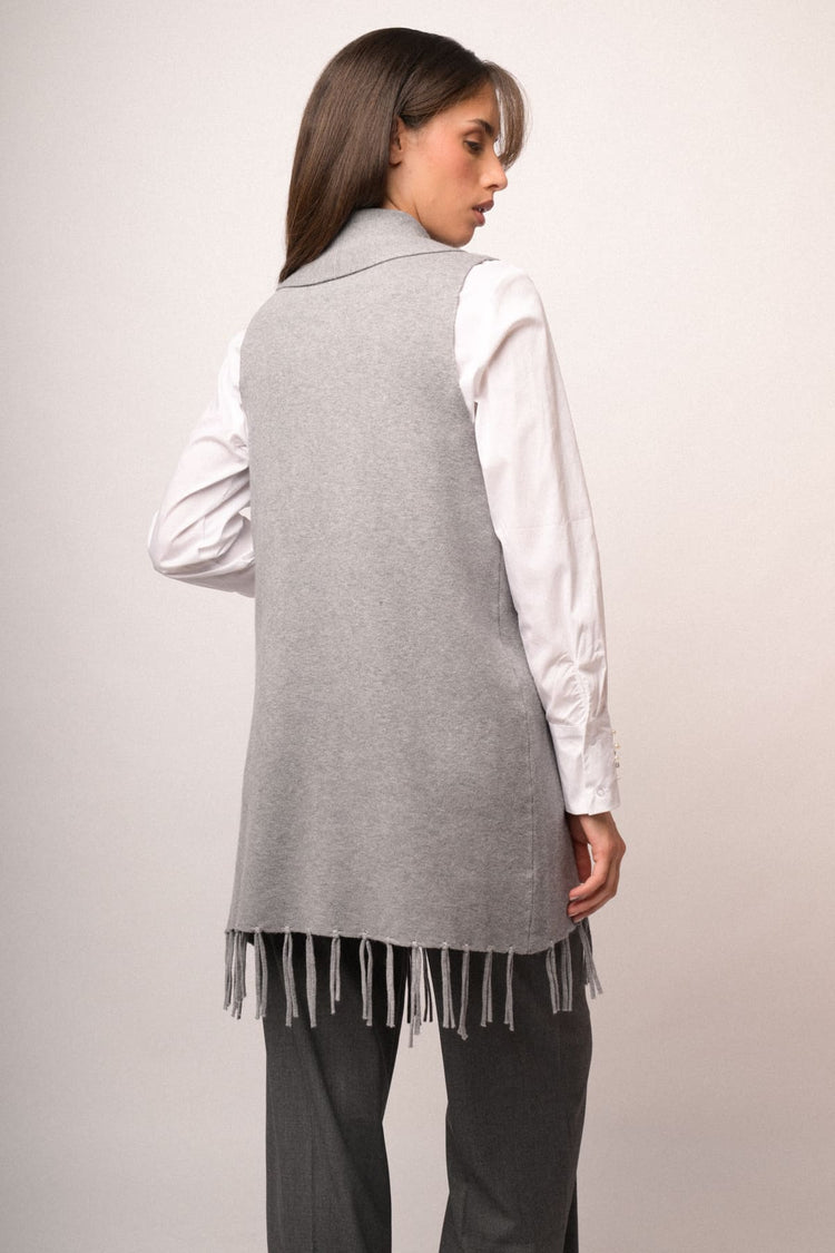 Gilet lungo con frange