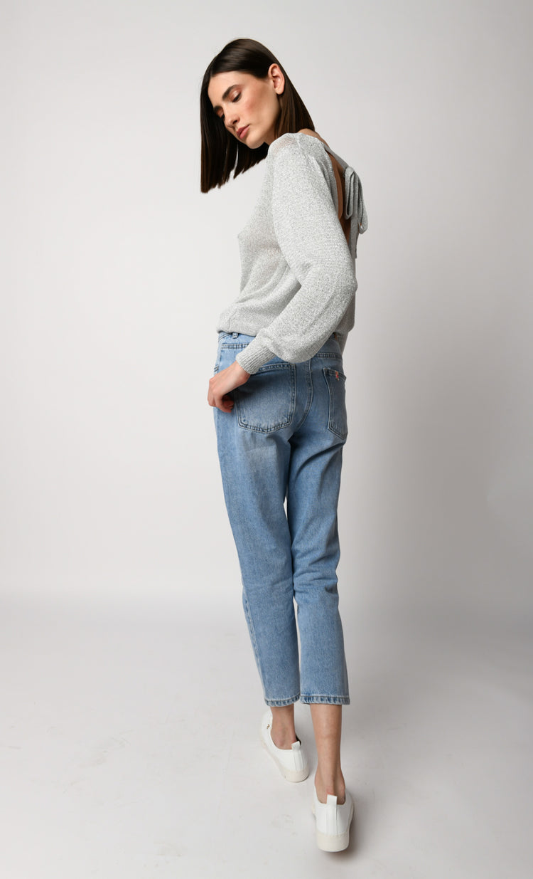 Jeans con strass all-over