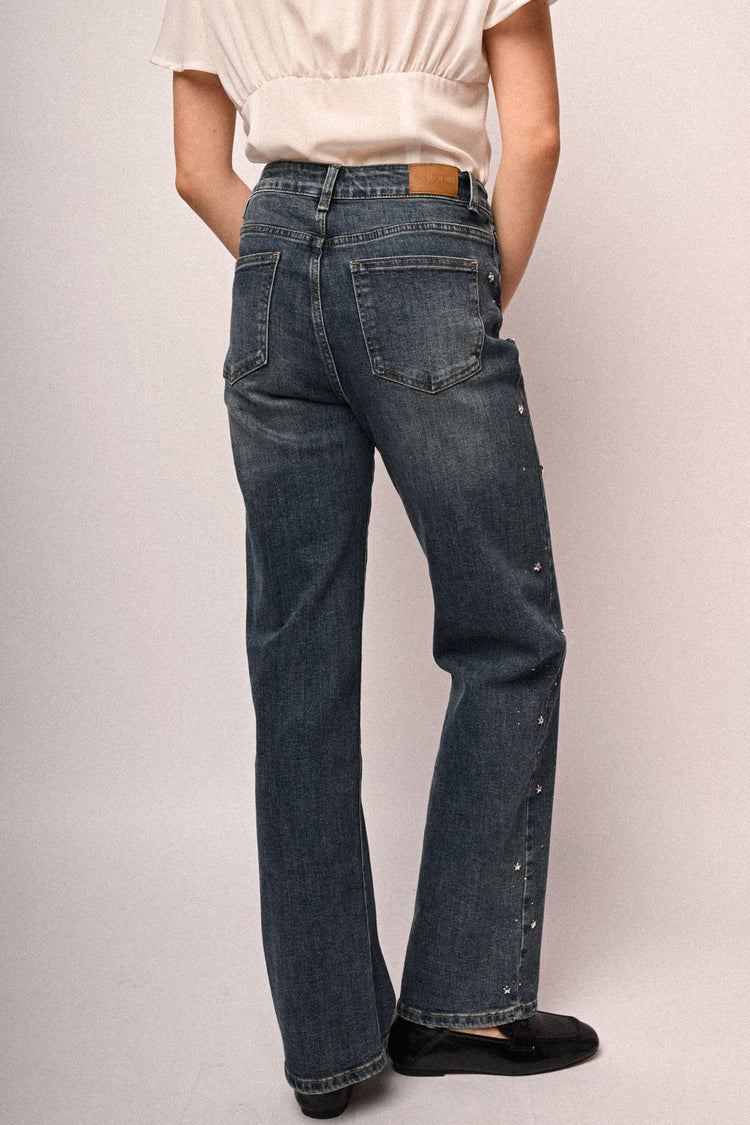Jeans con decorazione stelle e strass