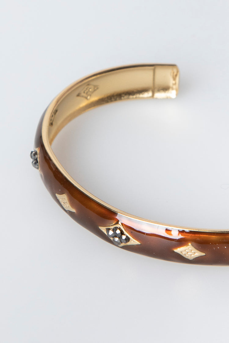 Bracciale rigido con decorazioni