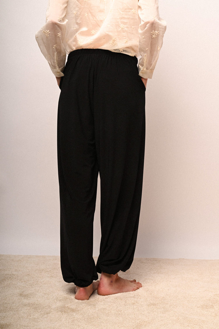 Pantaloni alla turca con tasche laterali
