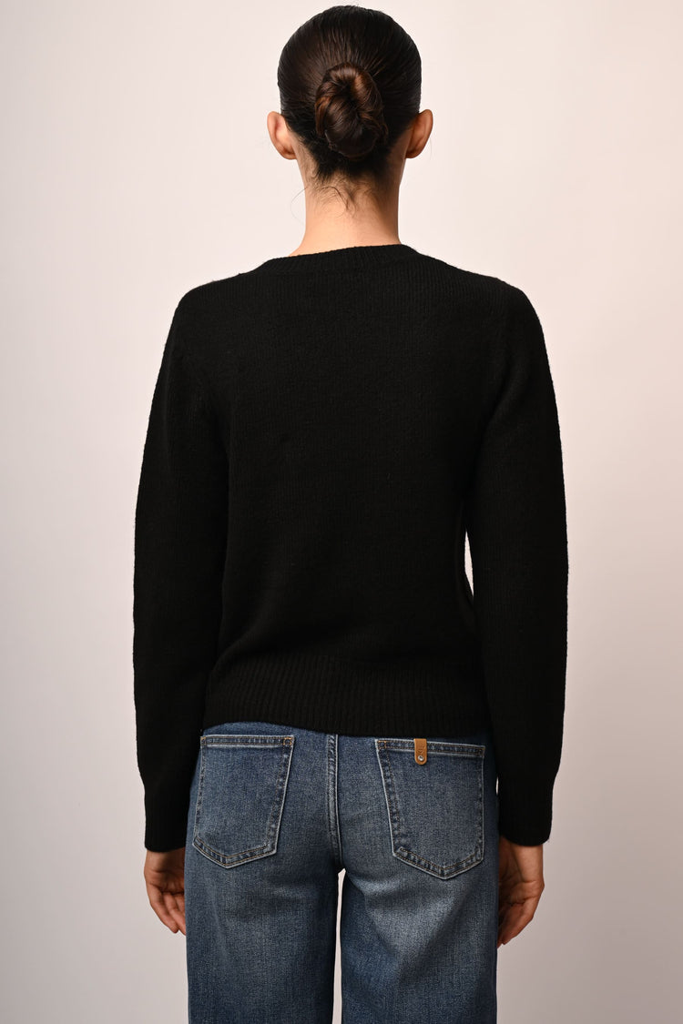 Pull con spille gioiello