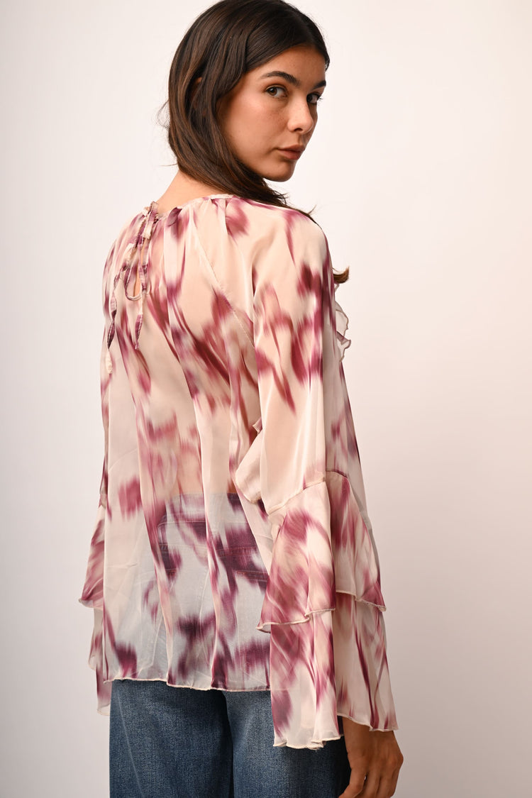 Blusa a stampa astratta con volants