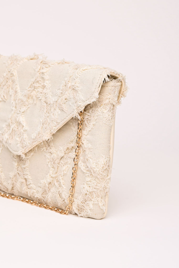 Pochette in denim jacquard a rombi