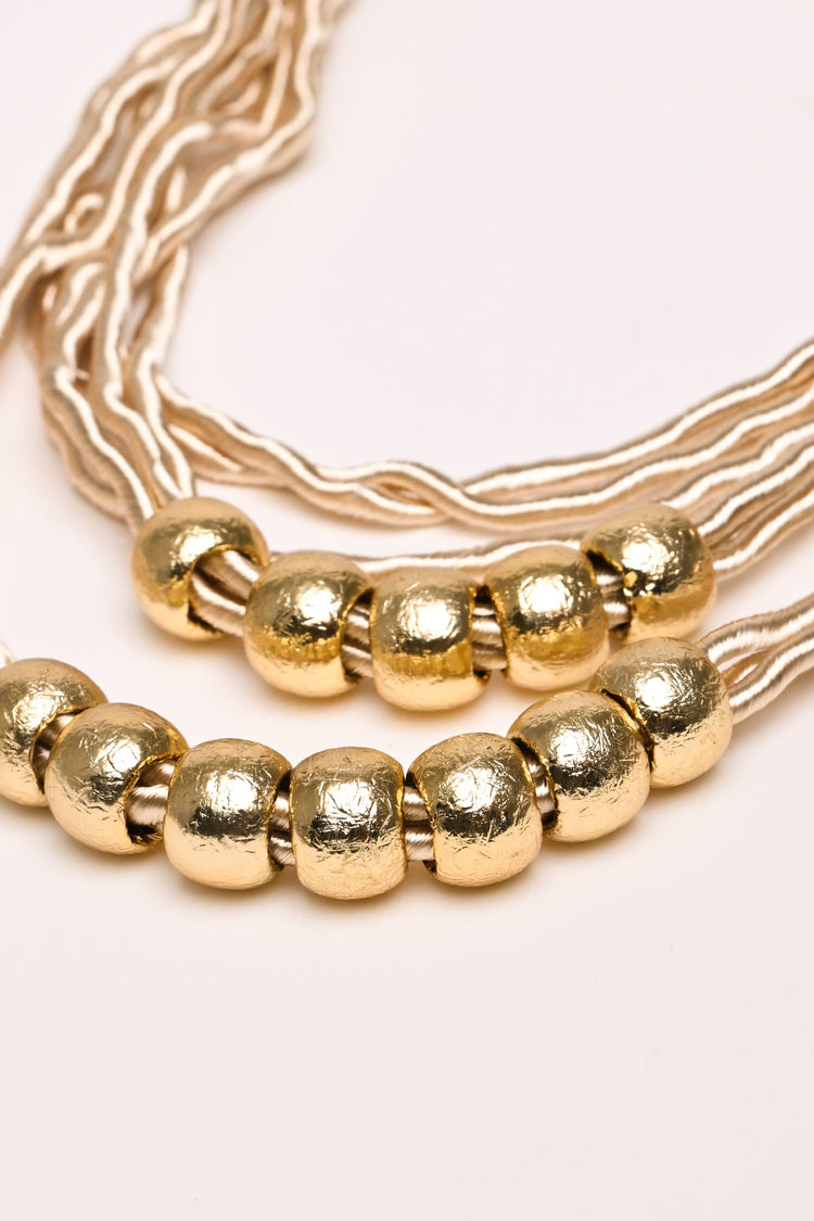 Collana a fili multipli con perline