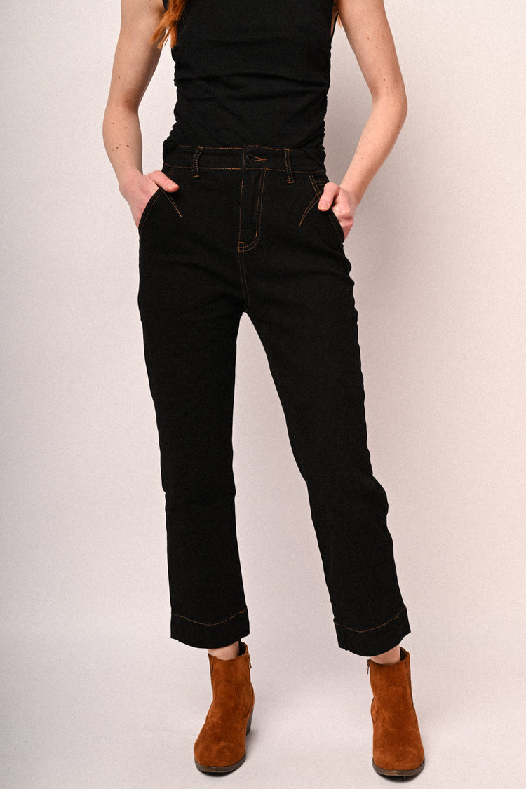 Jeans con impunture a contrasto