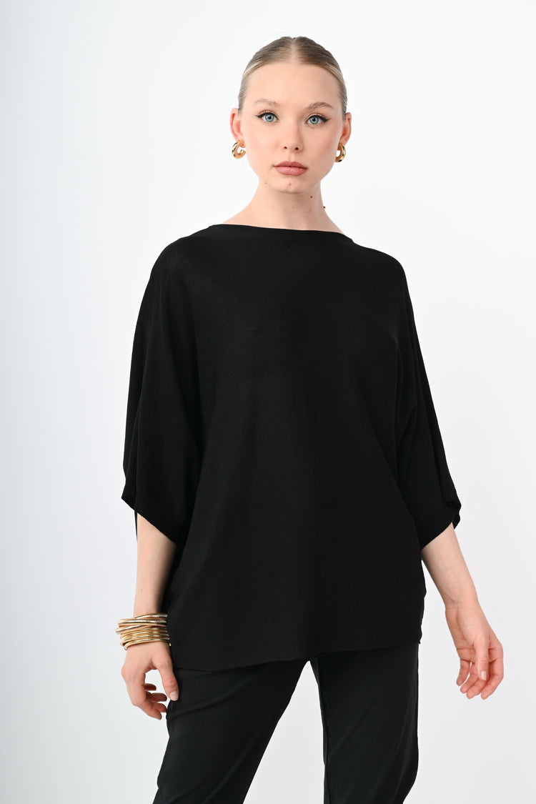 Top in maglia con maniche a pipistrello