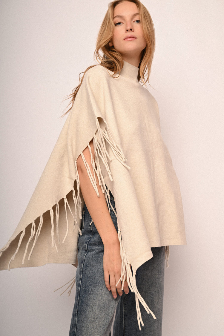 Poncho con frange