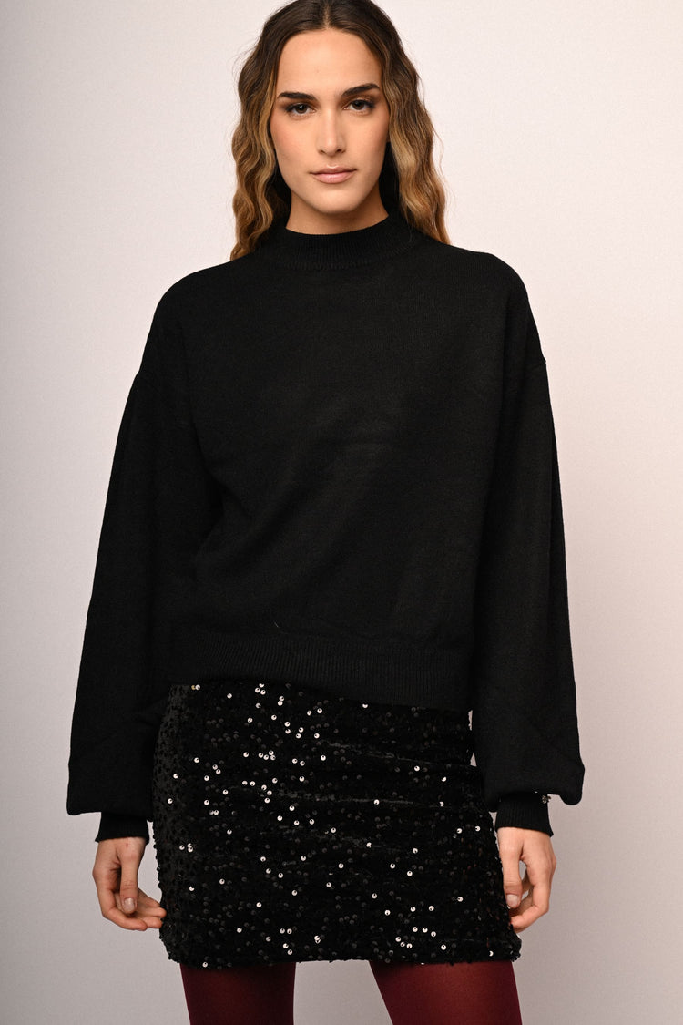 Dolcevita con strass ai polsini