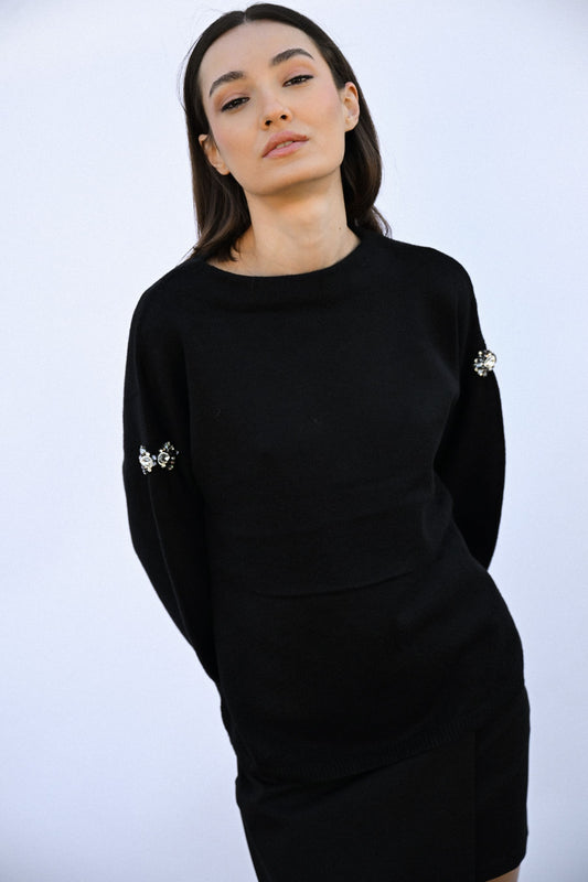 Pull con decorazioni gioiello