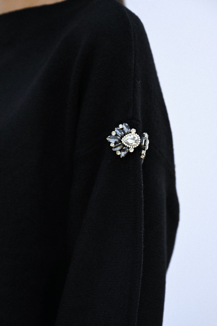 Pull con decorazioni gioiello
