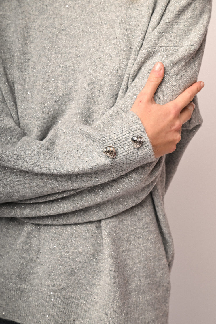 Pull con bottoni a cuore e strass