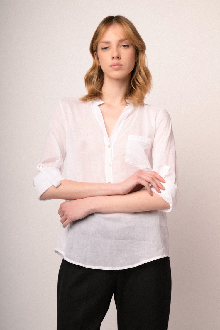 Blusa in cotone bianco con taschino