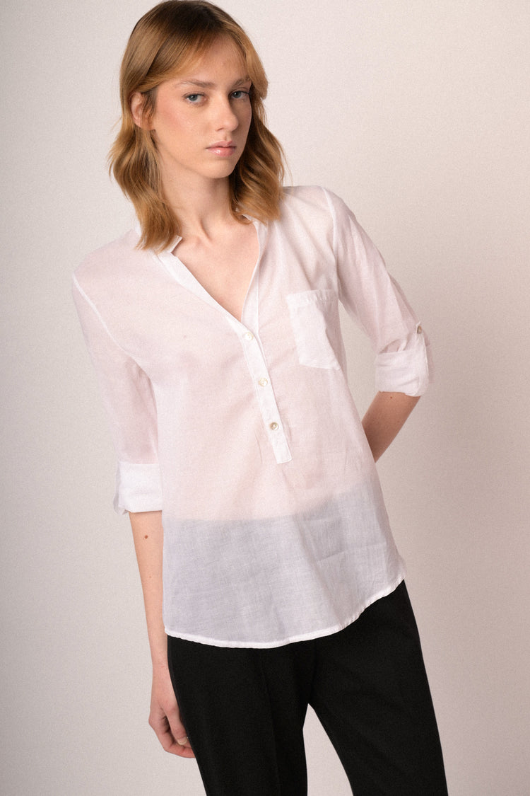 Blusa in cotone bianco con taschino