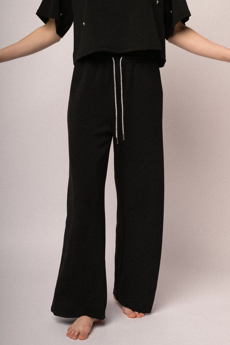 Pantaloni joggers con coulisse in strass
