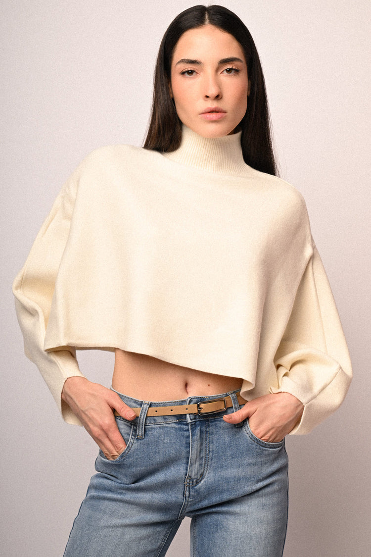 Pull a poncho con bottoni