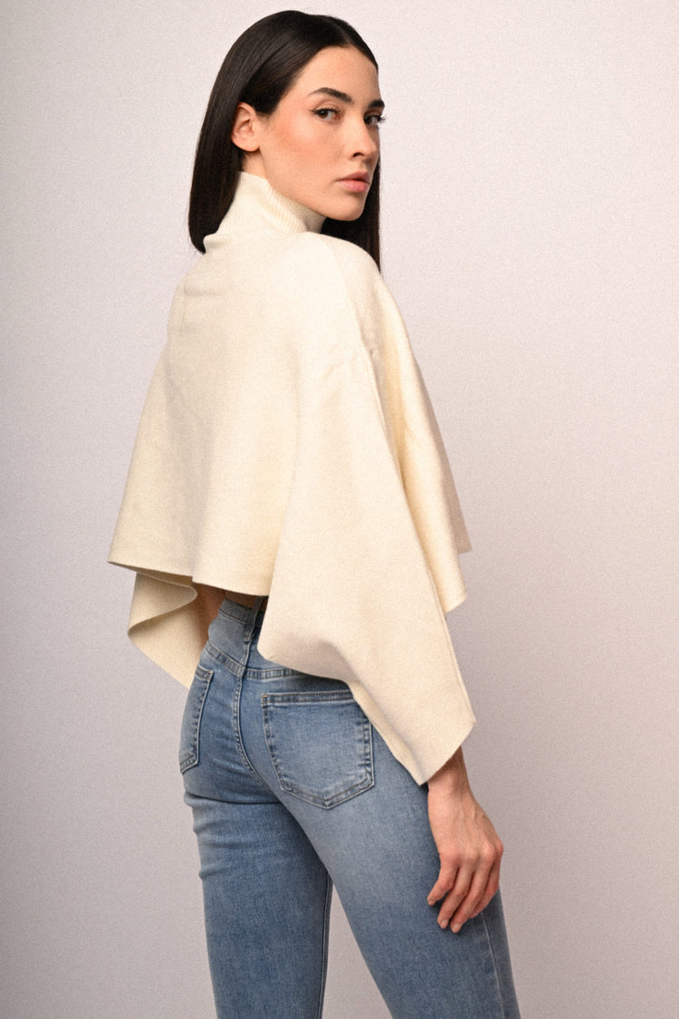 Pull a poncho con bottoni