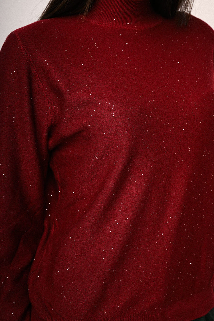 Lupetto con paillettes all-over