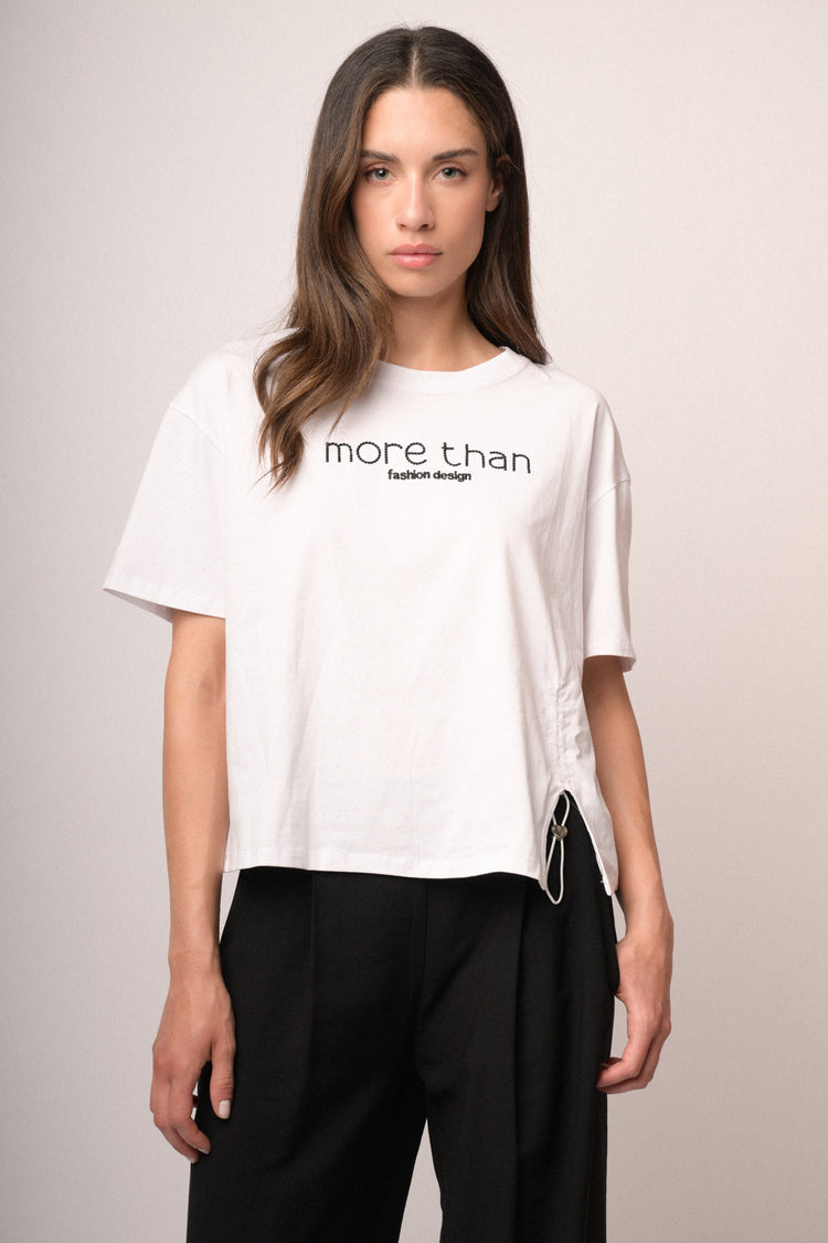 Maglia con scritta paillettes