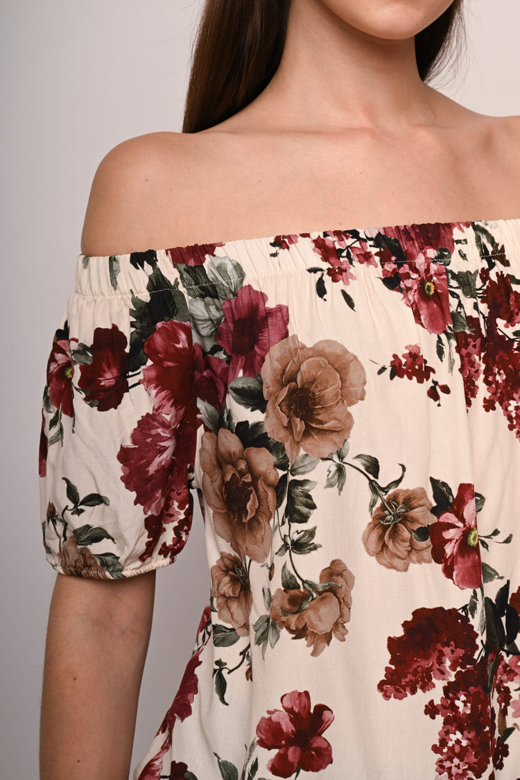 Top a stampa floreale con spalle scoperte