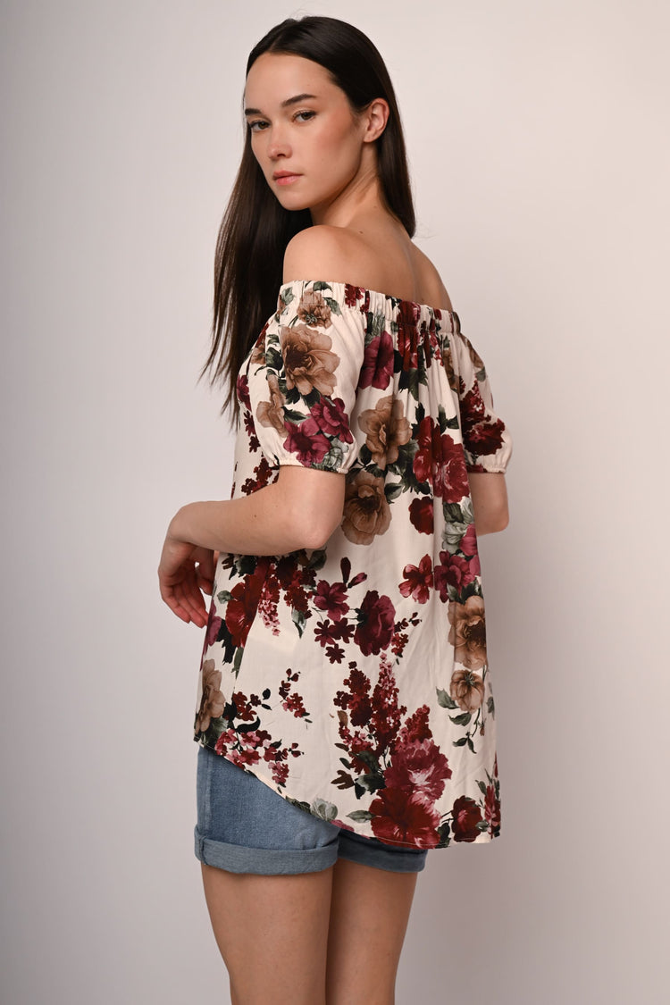 Top a stampa floreale con spalle scoperte