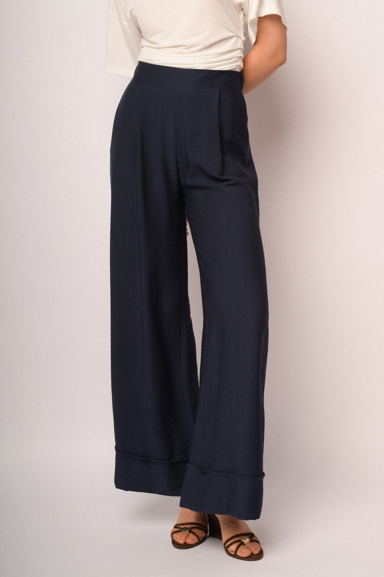 Pantaloni palazzo blu con risvolto
