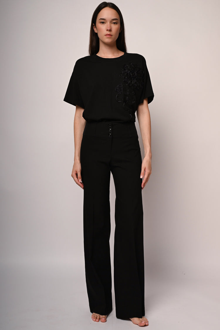 Pantaloni palazzo con bottoni