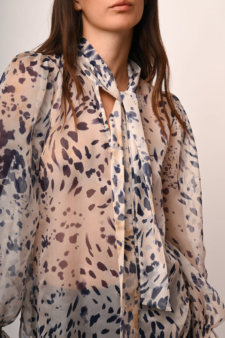 Blusa a stampa astratta con fiocco