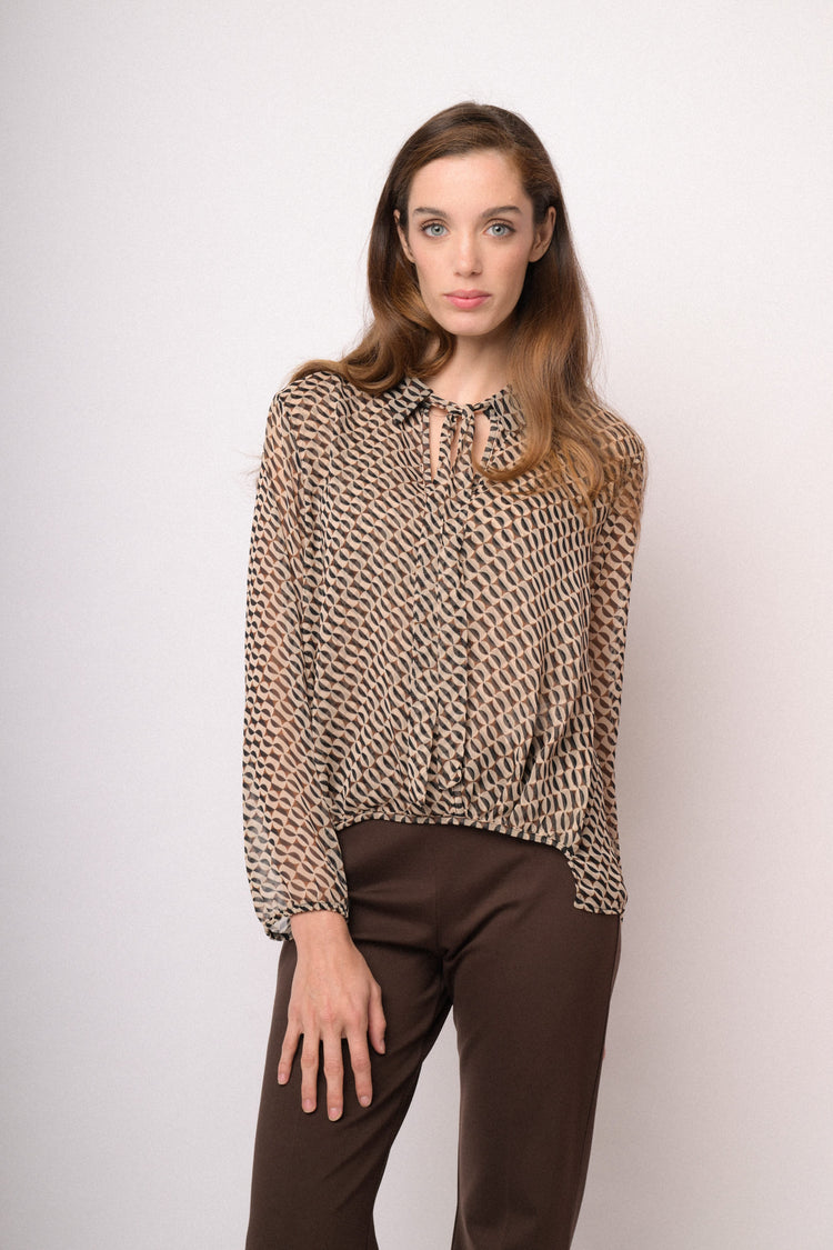 Casacca asimmetrica con motivo geometrico beige e nero