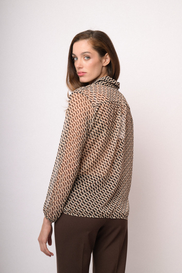 Casacca asimmetrica con motivo geometrico beige e nero