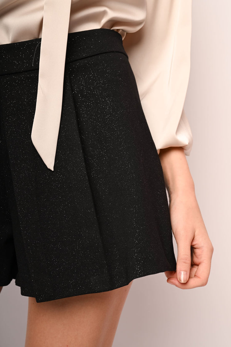 Skort con pieghe e glitter
