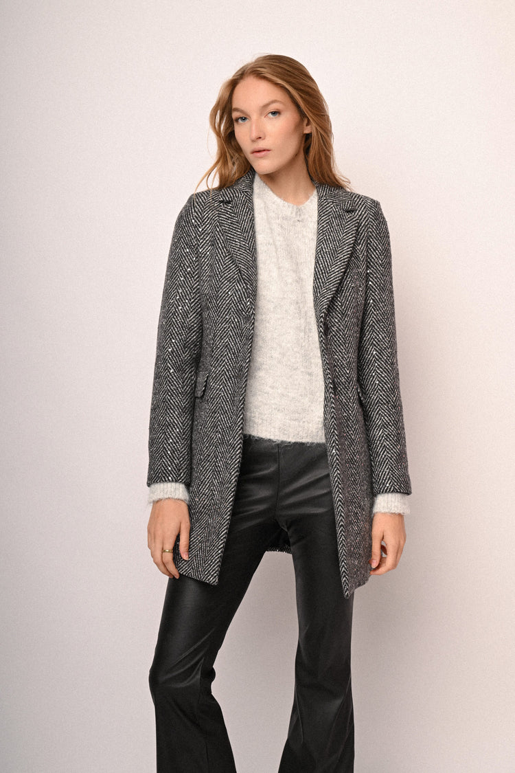 Cappotto con motivo chevron e paillettes