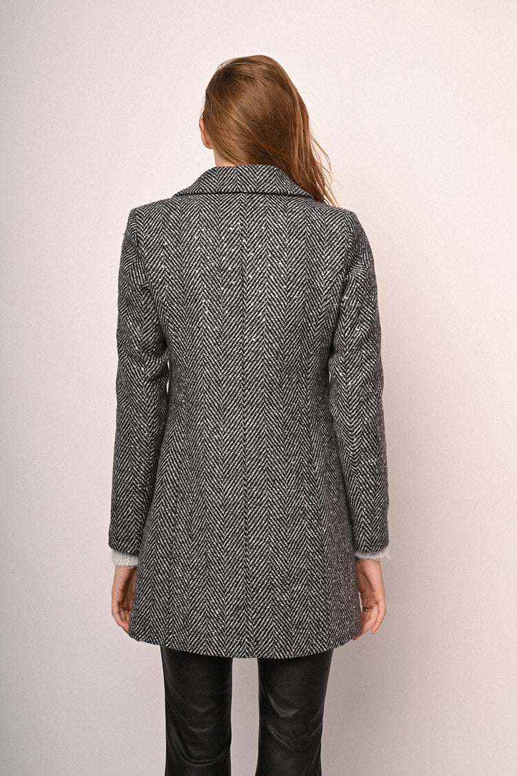 Cappotto con motivo chevron e paillettes
