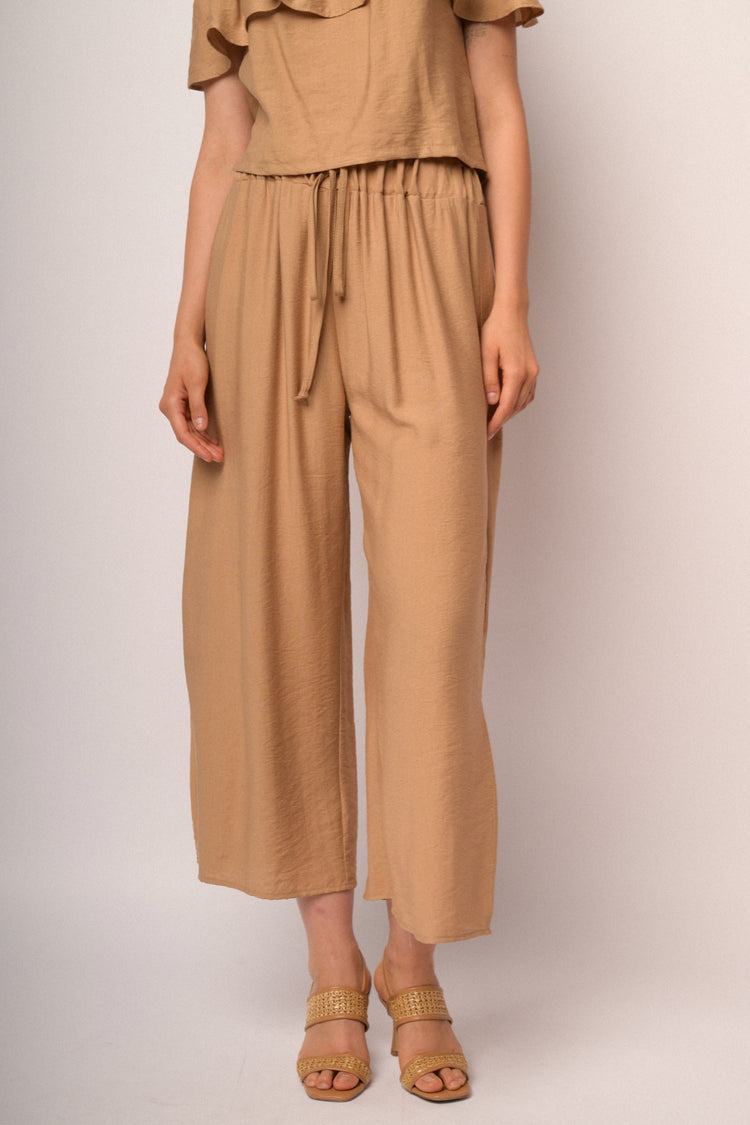 Pantaloni cropped cammello con spacco