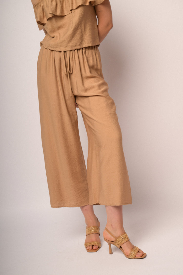 Pantaloni cropped cammello con spacco