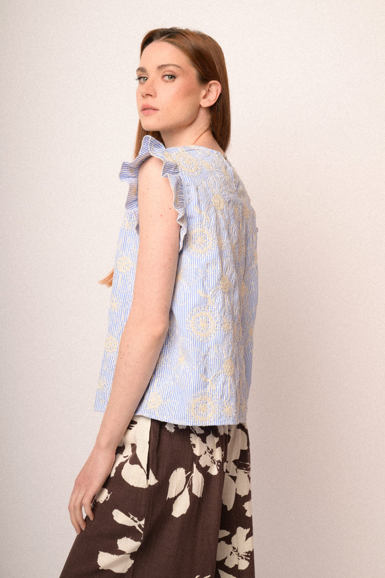 Top righe con ricami fiori