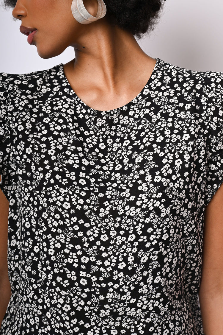 Top a stampa floreale con rouches